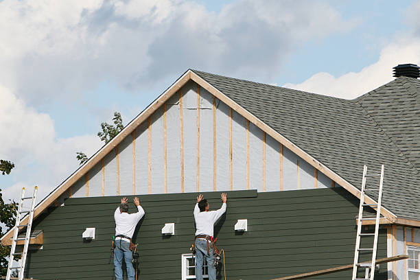 Professional Siding Repair technician working in Newington, VA